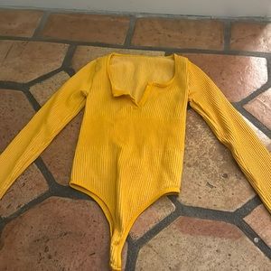 Orange ribbed bodysuit